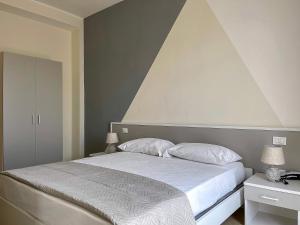 Postel nebo postele na pokoji v ubytování Karpignàna Hotel
