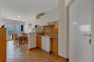 Kuchyňa alebo kuchynka v ubytovaní Apartments Vranjes