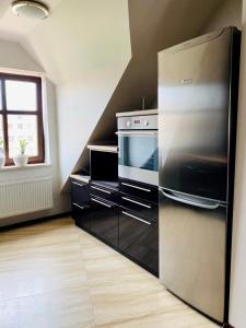Zdjęcie z galerii obiektu Apartament w mieście Szczytno