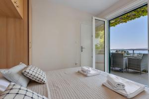 Posteľ alebo postele v izbe v ubytovaní Apartments Vranjes