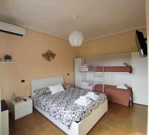 Postel nebo postele na pokoji v ubytování Villa Ada