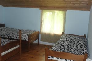 Voodi või voodid majutusasutuse Guesthouse Daeli toas