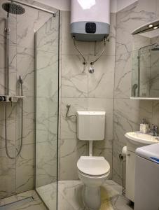 Koupelna v ubytování SmartMini Apartments