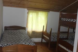 Voodi või voodid majutusasutuse Guesthouse Daeli toas