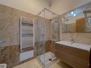 Koupelna v ubytování Karpignàna Hotel
