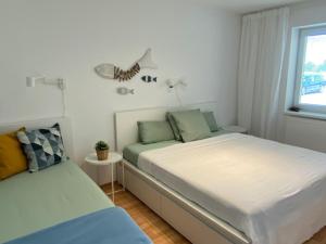 Postel nebo postele na pokoji v ubytování Cyklo Apartmán Třeboň