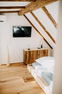TV a/nebo společenská místnost v ubytování Landhaus K07