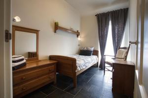 A bed or beds in a room at van Abelshoeve