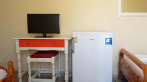 TV a/nebo společenská místnost v ubytování Intos Apartments + 26 fotografií