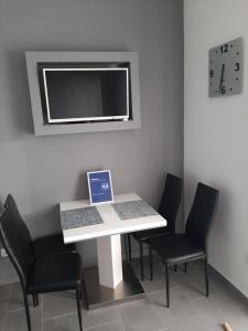 Телевизор и/или развлекательный центр в Apartment "MANNA