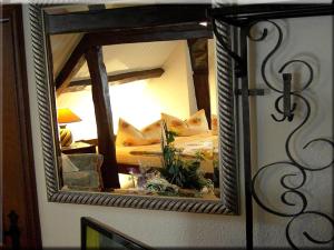 Postel nebo postele na pokoji v ubytování Hotel Graf Rolshausen