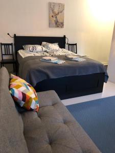 Säng eller sängar i ett rum på Mathildedal Private Apartments