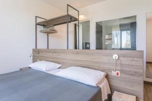 Postel nebo postele na pokoji v ubytování INSULA FELIX Bed&Breakfast