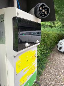 a parking meter with a car inside of it at L'Isolo b&b e case vacanza in Monzambano