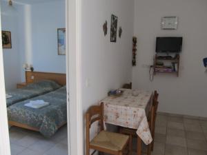 Posteľ alebo postele v izbe v ubytovaní VILLA EIRINI