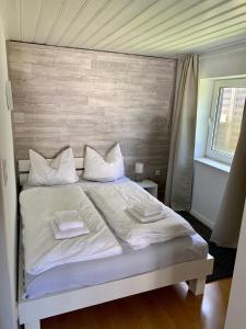 Giường trong phòng chung tại Ferienwohnung Winterberg Lodge