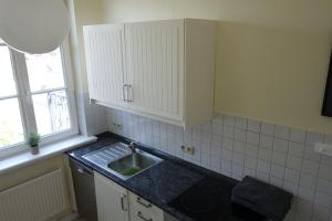 Nhà bếp/bếp nhỏ tại Goldene Feder +7 ảnh