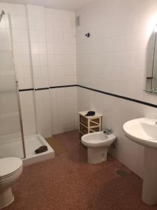Kúpeľňa v ubytovaní Apartamentos Super
