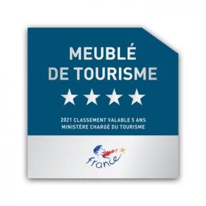 Un panneau bleu avec des étoiles et le texte mobile du tourisme dans l'établissement Duc de Bretagne Luxury Apparthotel, à Morlaix