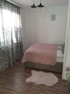 Katil atau katil-katil dalam bilik di Apartmani Vodice I