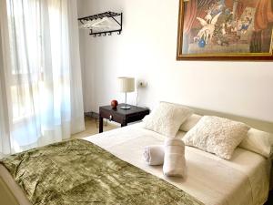 Giường trong phòng chung tại Ideal Apartamento - Guadalest