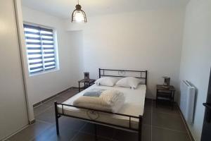 Postel nebo postele na pokoji v ubytování Gîte La Truffière
