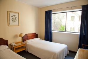 Postel nebo postele na pokoji v ubytování Hotel Santa Lucia + 29 fotografií