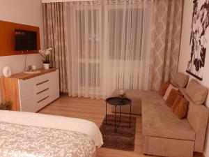 Posteľ alebo postele v izbe v ubytovaní Apartmán Hanka