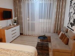 Posteľ alebo postele v izbe v ubytovaní Apartmán Hanka