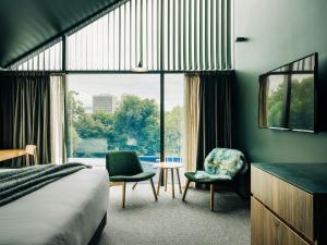 Postel nebo postele na pokoji v ubytování Moss Hotel + 37 fotografií