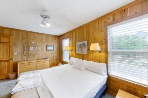 מיטה או מיטות בחדר ב-Loisstorm OS22