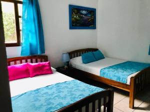 Postel nebo postele na pokoji v ubytování HC Liri Hotel