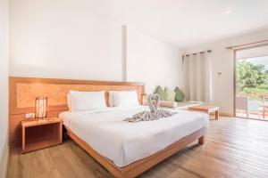 Postel nebo postele na pokoji v ubytování Samed Cabana Resort