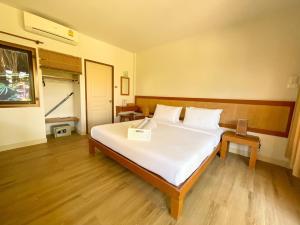 Postel nebo postele na pokoji v ubytování Samed Cabana Resort