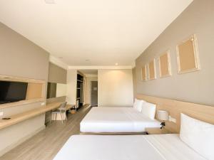 TV a/nebo společenská místnost v ubytování Rayong Chalet Resort