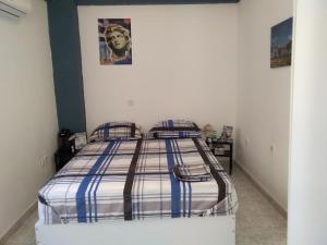 Posteľ alebo postele v izbe v ubytovaní Apollon Apartments H-2
