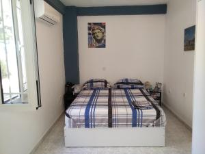 Posteľ alebo postele v izbe v ubytovaní Apollon Apartments H-2