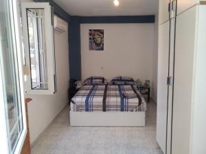Posteľ alebo postele v izbe v ubytovaní Apollon Apartments H-2