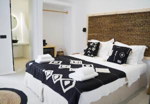 מיטה או מיטות בחדר ב-King's Suites