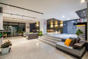 Ruang duduk di Orbi Palace Hotel Official