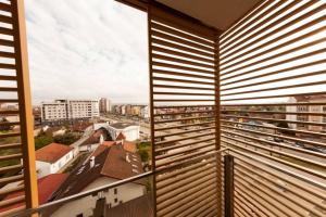 a view of a city from the window of a building at Diagonala 2 in Novi Sad
