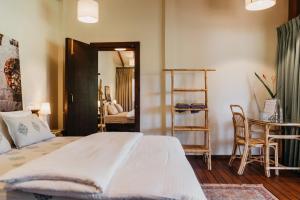 Mojigao - Eco Resort客房内的一张或多张床位