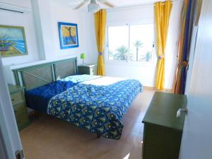 Ένα ή περισσότερα κρεβάτια σε δωμάτιο στο GMID IMMO Apartamento Oasis Atico