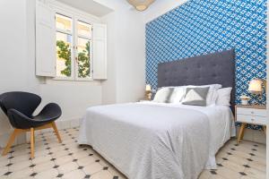 Posteľ alebo postele v izbe v ubytovaní Genteel Home Cervantes