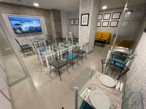 a dining room with a table and chairs at Smart Hotel Budapest & Apartments in Budapest