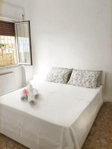 Postel nebo postele na pokoji v ubytování Seafront apartment 2 in Villa near Rome