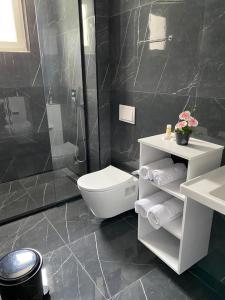 Koupelna v ubytování Hotel Viroi