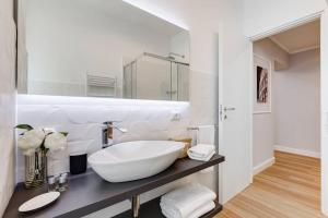 Koupelna v ubytování Migliori Collection Apartment via Modena