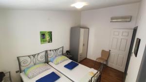 Postel nebo postele na pokoji v ubytování Apartments Veronika