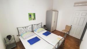 Postel nebo postele na pokoji v ubytování Apartments Veronika